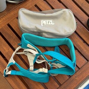 Petzl Teal and Gray Climbing Harness with storage bag